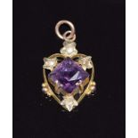 Edwardian 15ct gold pendant in the form of a heart set with an amethyst and seed pearls, 1.6g