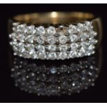 A 9ct gold ring set with four rows of diamonds, total diamond weight approximately 0.9ct, 5.5g, size