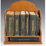 Asprey oak miniature book shelf, with reference library books including atlas, encyclopedia and