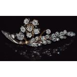 Victorian brooch set with old cut diamonds in a floral and foliate design, 5cm long, 5.5g