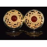 A pair of 14ct gold earrings set with agate in a pierced setting, 7.2g