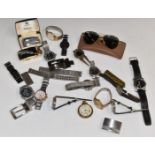 A collection of watches, Ronson lighter, vintage Ray-Ban sunglasses, belt buckles for Jaguar, Gucci,