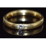 An 18ct gold ring set with a diamond of approximately 0.1ct, 4.0g, size M/N