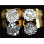 A pair of 18ct gold studs set with an old cut diamond of approximately 0.2ct to each