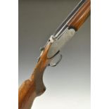 Rizzini 12 bore over and under shotgun with engraved sidelock plates, locks, trigger guards,