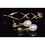 A pair of 9ct gold earrings set with a pearl to each and a 9ct gold earring, 5g