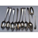 Nine Georgian Irish hallmarked silver table spoons with bright cut decoration, four Dublin 1782, two