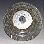 A serpentine stone circular barometer, diameter 20cm