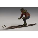 Cold painted bronze or similar skier, c1930s, L16.5cm