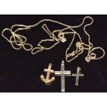 Two 9ct gold crosses, 9ct gold anchor and two 9ct gold chains, 6.2g