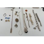 A collection of silver jewellery including pendant set with amber, locket, cigarette case, ring with