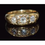 Edwardian 18ct gold ring set with three old cushion cut diamonds of approximately 0.4, 0.3 & 0.