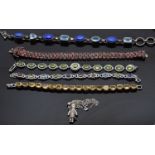 Two silver bracelets including one set with lapis lazuli & topaz and one with garnets together