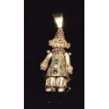 A 9ct gold pendant in the form of a clown set with an emerald, ruby, sapphire and paste, 6.5g