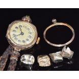 A 9ct gold watch, gold teeth and 9ct gold mount (10.8g)