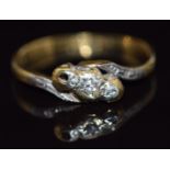 An 18ct gold ring set with diamonds in a twist setting, 1.8g, size J/K