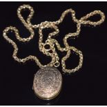A 9ct gold Victorian necklace (10g) and rolled gold locket with engraved decoration