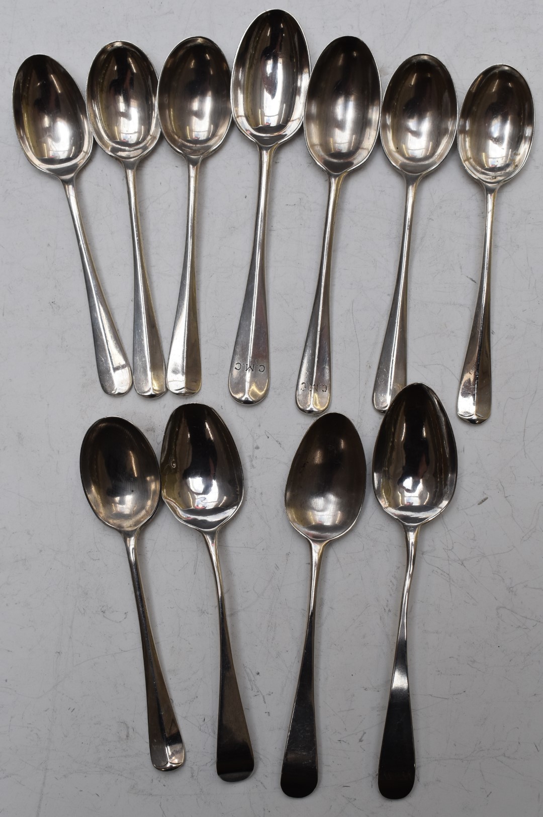 Eleven Georgian and later hallmarked silver teaspoons including eight rat tail examples, two