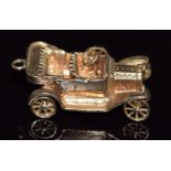 A 9ct gold pendant/ charm in the form of a car, 7.2g