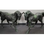 A handed pair of bronze horses, for garden or similar display, L120cm, H105cm