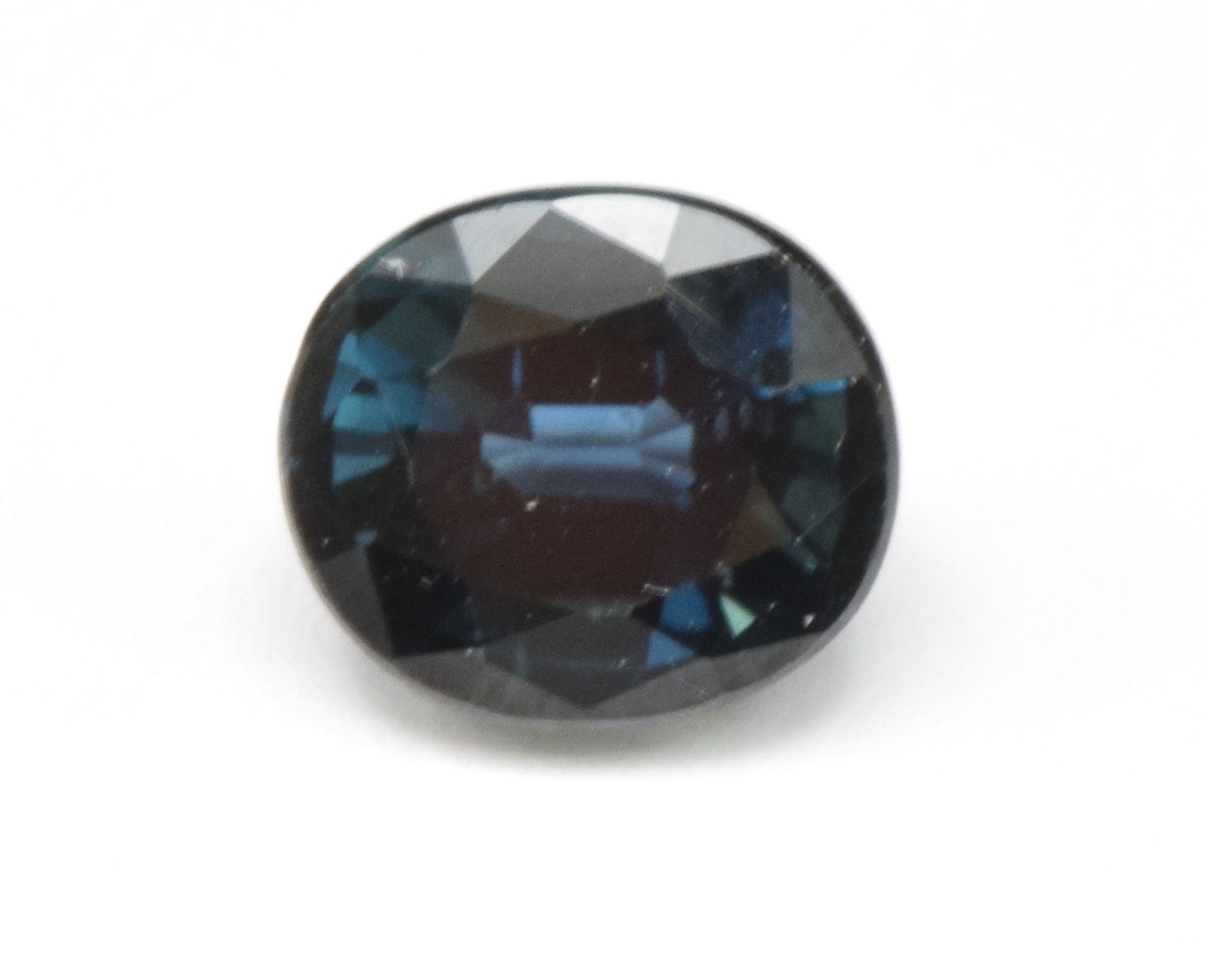 A loose 1.43ct oval cut natural sapphire, with certificate