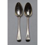Pair of Georgian bottom hallmarked silver Old English pattern table spoons, marks indistinct,