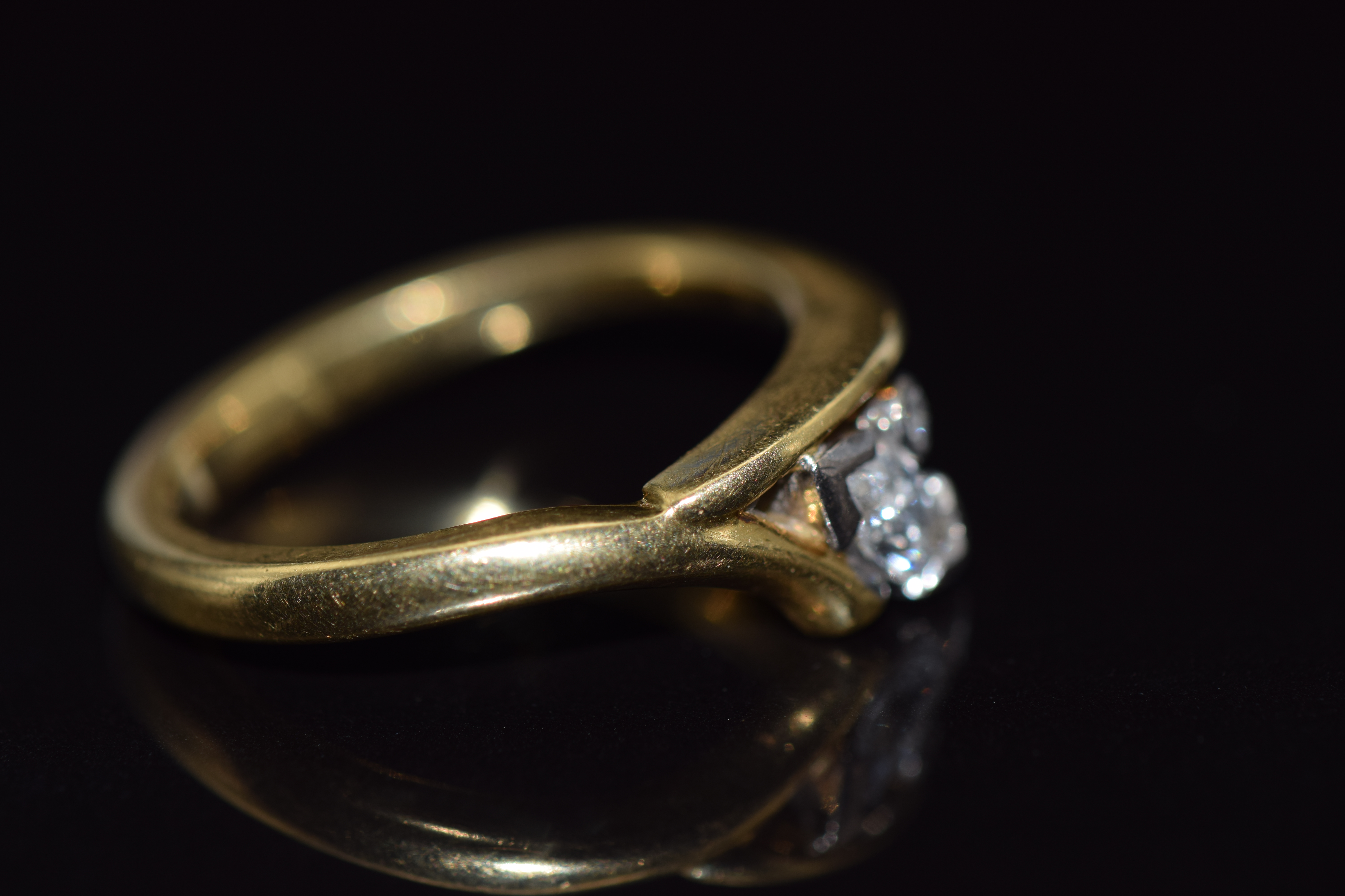 An 18ct gold ring set with a marquise cut diamond of approximately 0.27ct and a round cut diamond, - Image 2 of 2