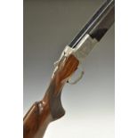 Browning B425 Grade 5 12 bore over and under shotgun with fine engraving featuring birds and dogs to