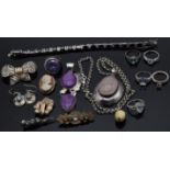 A collection of silver jewellery including two large pendants, bracelet, rings, Victorian paste