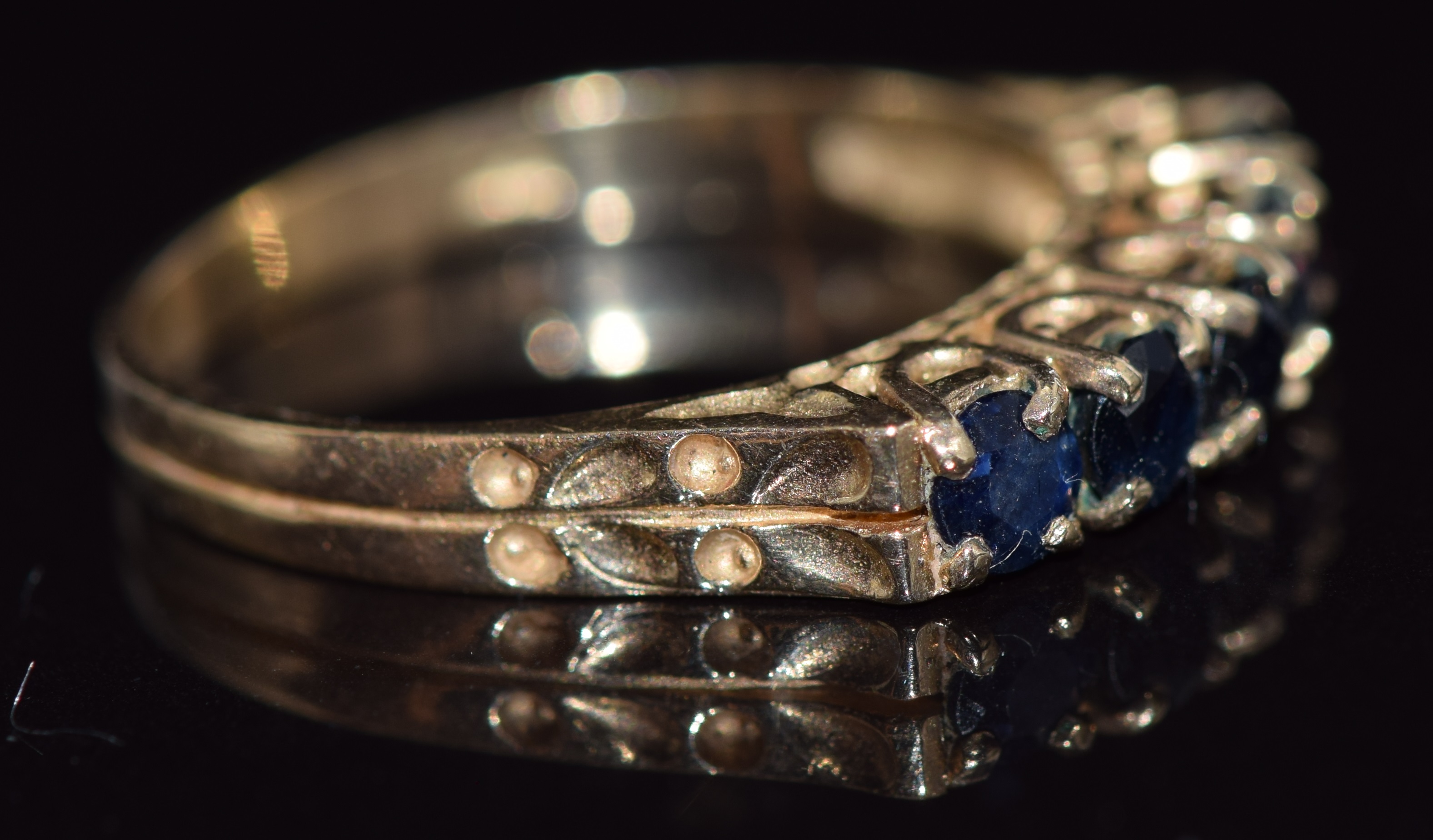 A 9ct gold ring set with five round cut sapphires, 2.4g, size M/N - Image 2 of 2