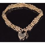 A 9ct gold gate bracelet with heart padlock, 14.9g