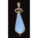 A 9ct gold pendant set with blue lace agate, verso faux sunstone, 4.5 x 1.1cm