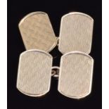 A pair of 9ct gold cufflinks with engine turned decoration, 4.1g