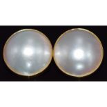 A pair of 18ct gold earrings set with a Mabe pearl to each