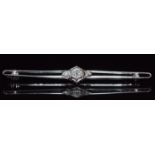 Art Deco platinum brooch set with three diamonds, in original box, 2.3g, 5.8cm