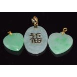 Chinese jadeite pendant with 14k gold pendant loop and Chinese character to the centre and two heart