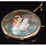 Victorian brooch set with a painted porcelain plaque depicting Leda and the swan, 4.5 x 3.7cm