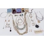 A collection of silver jewellery including necklaces, rings, bracelets, etc