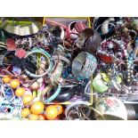 A collection of costume jewellery including bangles, necklaces, etc