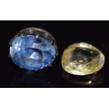 A loose natural untreated yellow sapphire of approximately 1.2ct and a loose natural oval cut