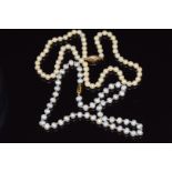Two single strand cultured pearl necklaces, both with 9ct gold clasps