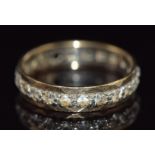 A 9ct gold eternity ring set with paste, 2.7g, size P