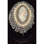 Victorian brooch set with a portrait miniature to the centre surrounded by rose cut diamonds, faux