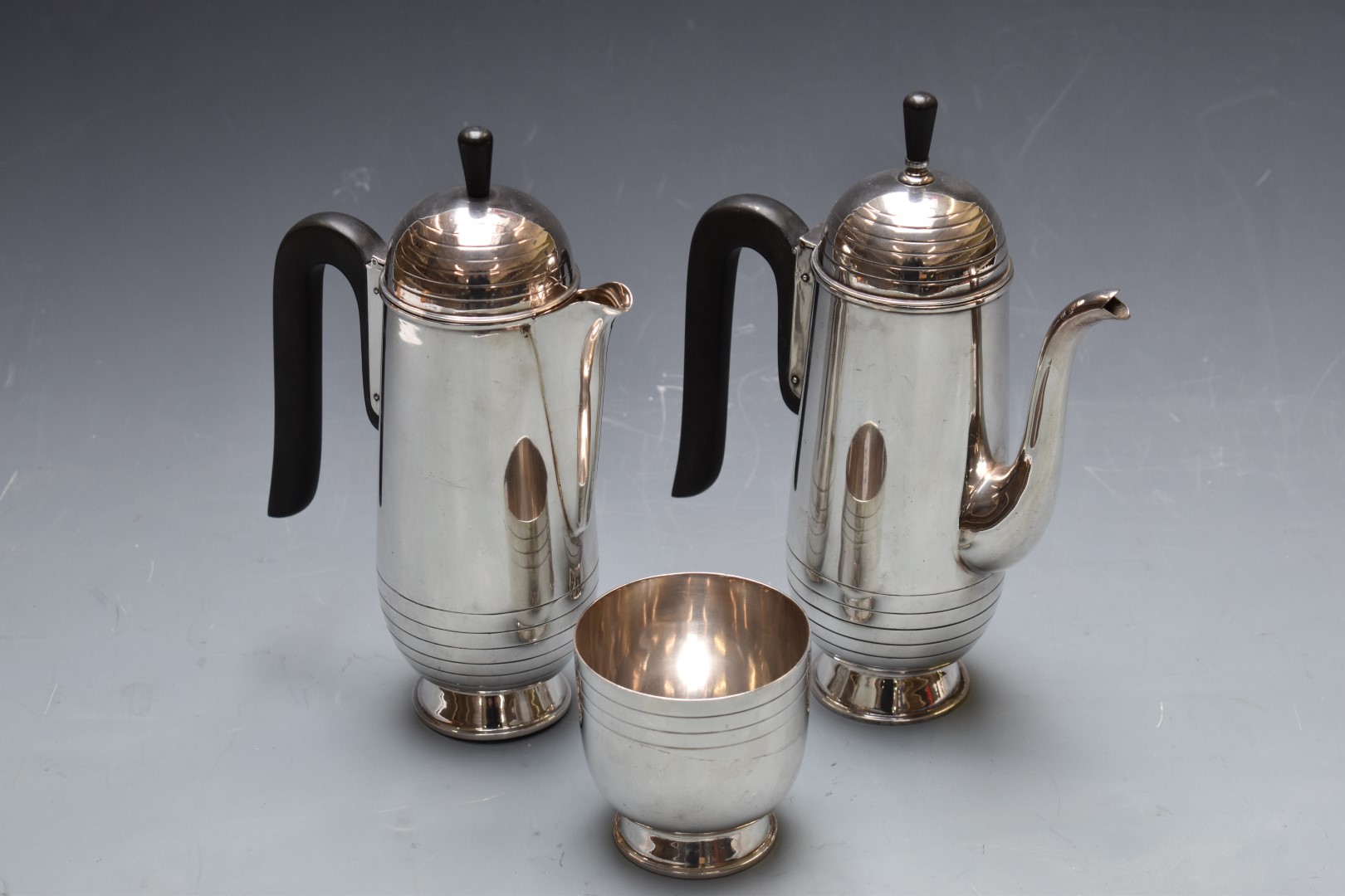 Silver plated Modernist teapot, hot water jug and sugar basin, height of tallest 23cm