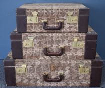 Vintage Pierre Balmain designer set of three graduated suitcases, the largest W71 x D46 x H21cm
