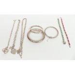 A collection of silver including three bangles, three bracelets and a necklace