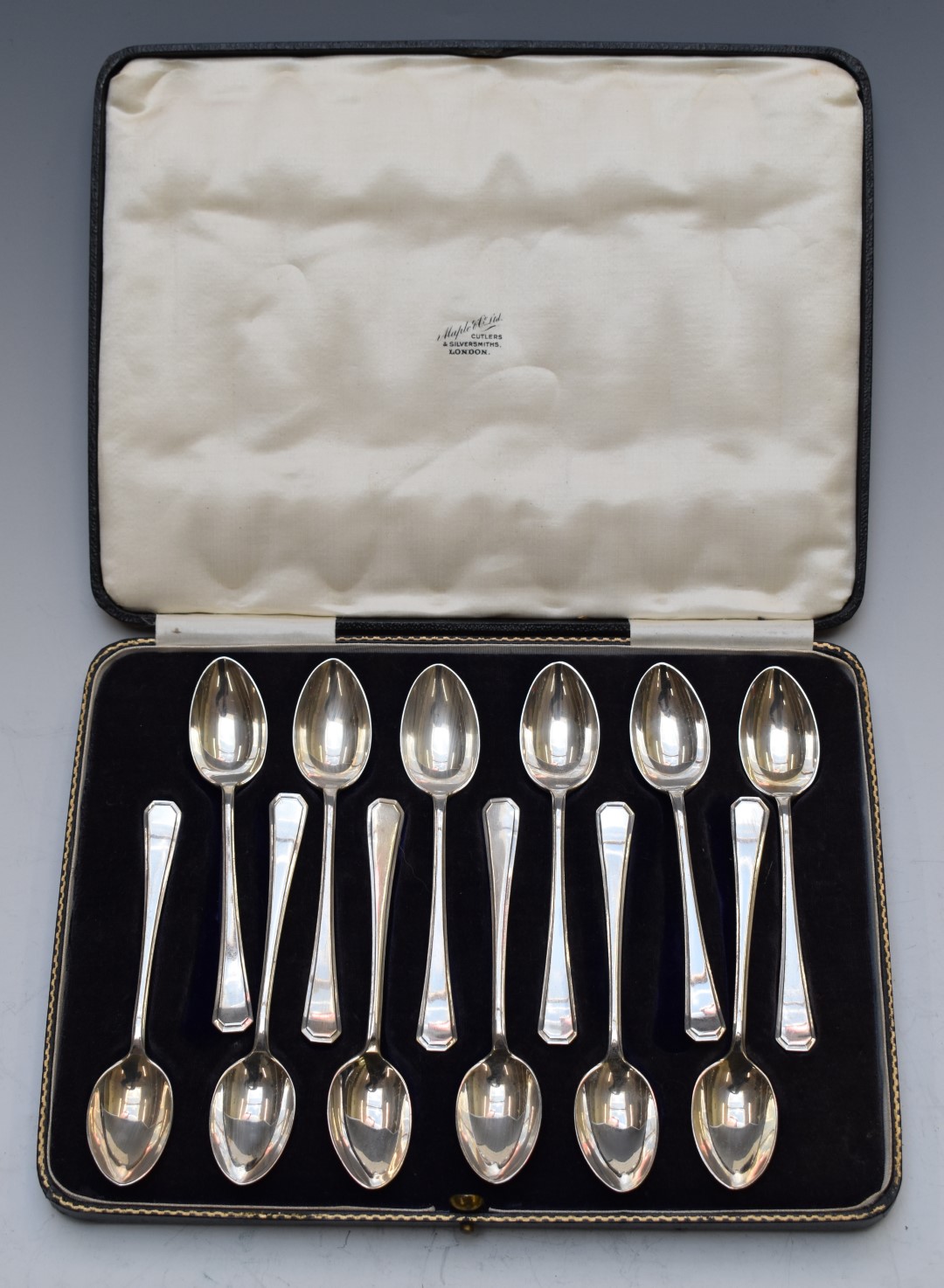 Cased set of twelve Art Deco hallmarked silver teaspoons, Sheffield 1932, maker Harrison