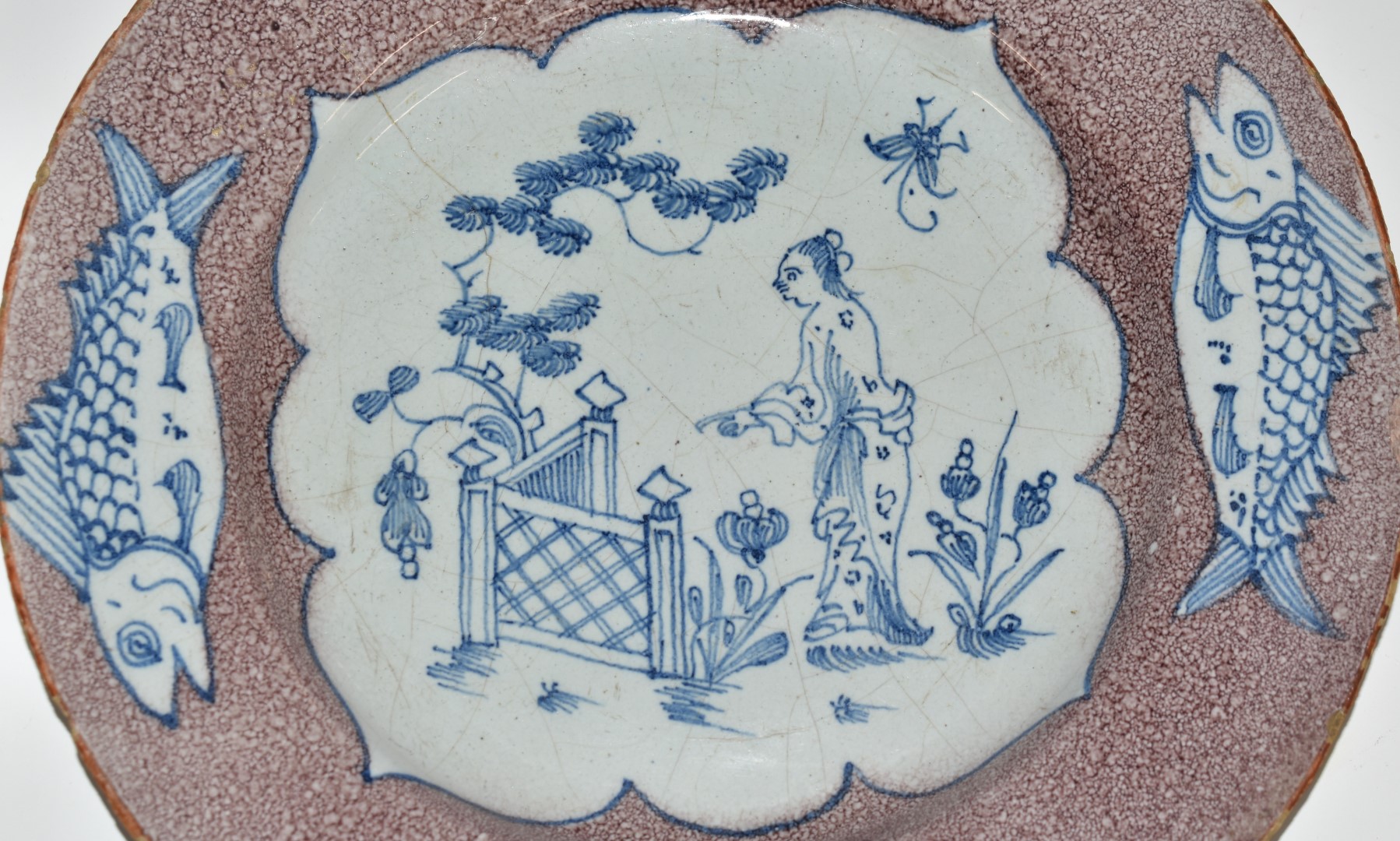 English Delft plate, London c1750, decorated with a chinoiserie garden scene within a border of four - Image 4 of 6