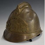 French fireman's helmet with Sapeurs Pompiers, Biviers to front plate, complete with chinstrap and