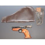 Webley Premier .177 target air pistol with shaped wooden grips and adjustable trigger and sights,
